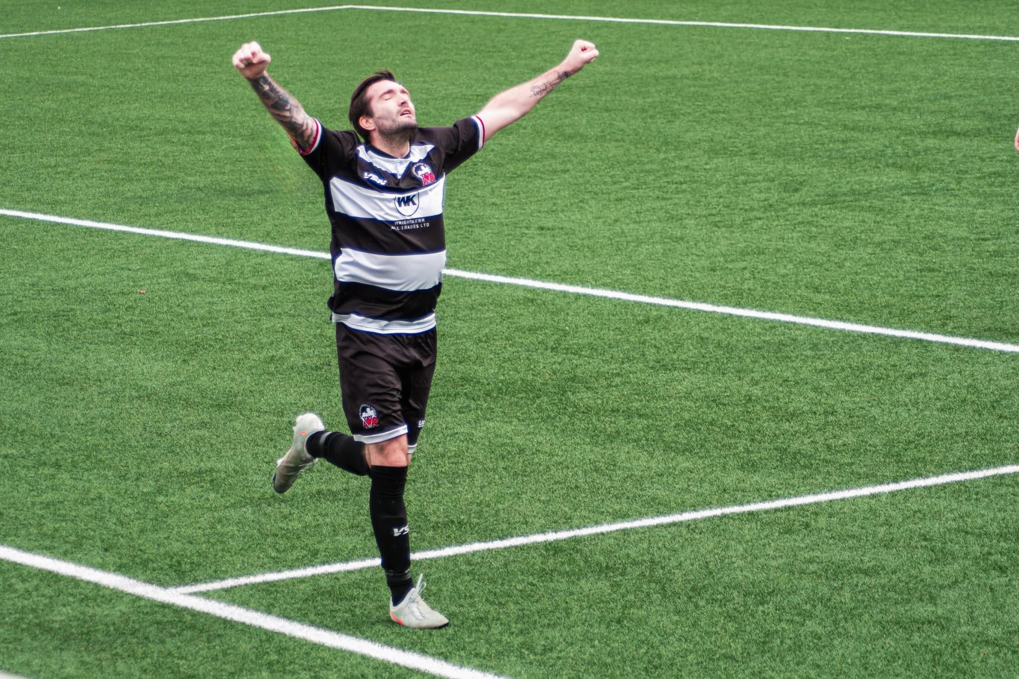 Winton Rovers player celebrates a goal